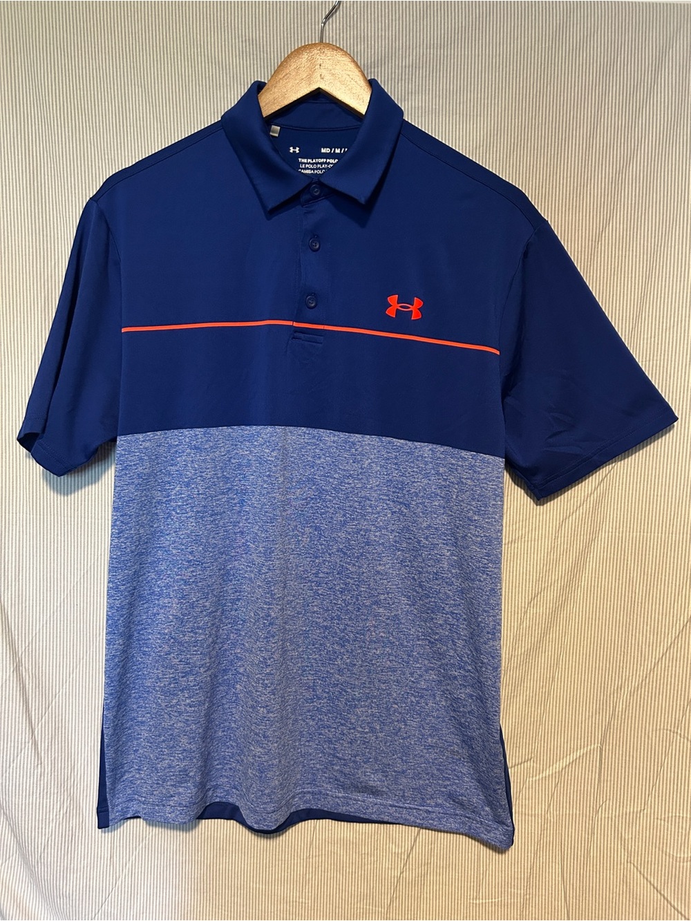 Under Armour Men’s Navy and Heather Blue Polo with Orange Accent